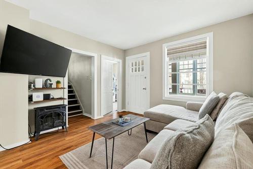 112 Egerton Road, Winnipeg, MB - Indoor Photo Showing Living Room With Fireplace
