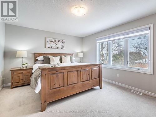Spacious primary suite with walk-in closet - 7 - 13 Braida Lane, Halton Hills, ON - Indoor Photo Showing Bedroom