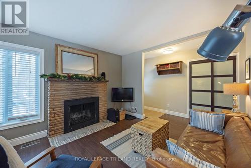 662 Eden Avenue, London South (South R), ON - Indoor Photo Showing Living Room With Fireplace