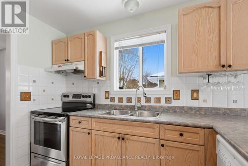 94 Sandbanks Court, Prince Edward County (Wellington Ward), ON - Indoor Photo Showing Kitchen With Double Sink
