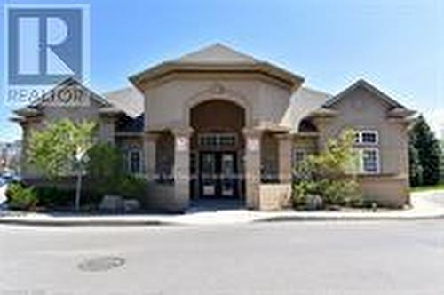 202 - 1411 Walkers Line, Burlington (Tansley), ON - Outdoor With Facade