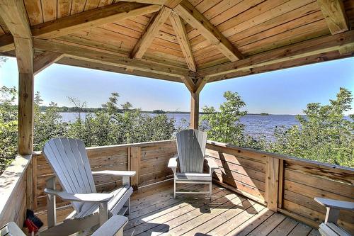 Patio - 101 Rue Des Cormorans, Val-D'Or, QC - Outdoor With Body Of Water With Deck Patio Veranda With Exterior