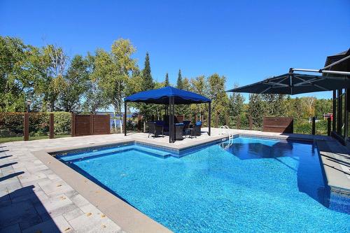 Pool - 101 Rue Des Cormorans, Val-D'Or, QC - Outdoor With In Ground Pool With Deck Patio Veranda With Backyard