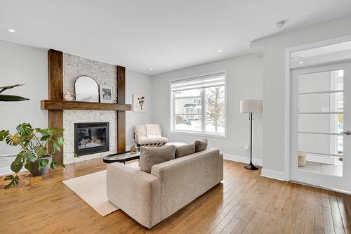 Salon - 30 Place De La Pulperie, Saint-Jérôme, QC - Indoor Photo Showing Living Room With Fireplace