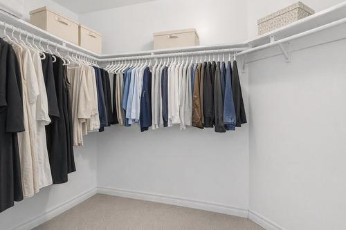 Walk-in closet - 302-2525 Rue Dutrisac, Vaudreuil-Dorion, QC - Indoor With Storage