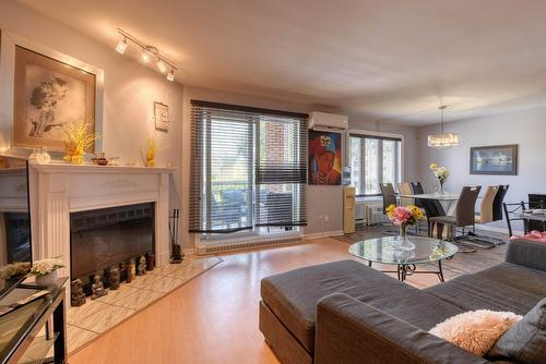 Salon - 21-54 Rue De Courcelle, Repentigny (Repentigny), QC - Indoor Photo Showing Living Room With Fireplace