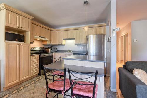 Cuisine - 21-54 Rue De Courcelle, Repentigny (Repentigny), QC - Indoor Photo Showing Kitchen With Double Sink