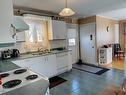Kitchen - 11 Boul. Perron E., Matapédia, QC  - Indoor Photo Showing Kitchen With Double Sink 
