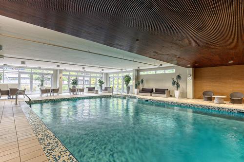Pool - 608-4900 Boul. De L'Assomption, Montréal (Rosemont/La Petite-Patrie), QC - Indoor Photo Showing Other Room With In Ground Pool