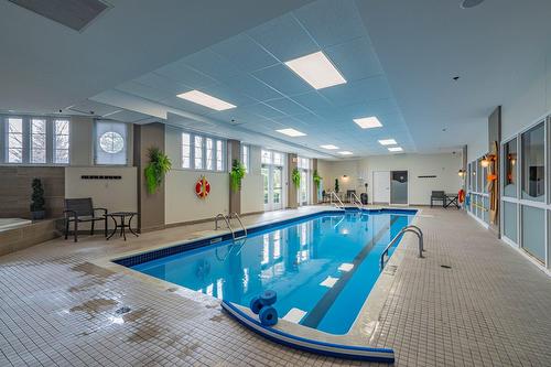 Piscine - 308-5000 Boul. Jacques-Bizard, Montréal (L'Île-Bizard/Sainte-Geneviève), QC - Indoor Photo Showing Other Room With In Ground Pool