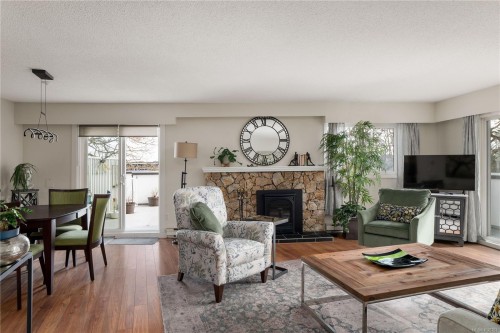 116-3962 Cedar Hill Rd, Saanich, BC - Indoor Photo Showing Living Room With Fireplace