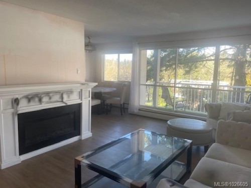 4201-997 Bowen Rd, Nanaimo, BC - Indoor Photo Showing Living Room With Fireplace