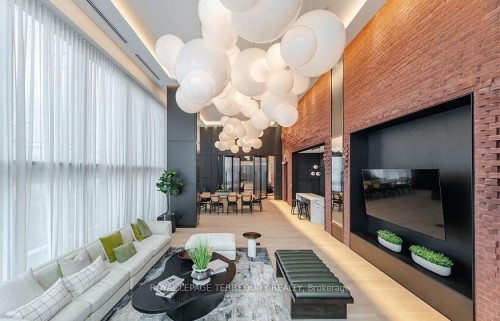 806-3200 William Coltson Avenue, Oakville, ON - Indoor Photo Showing Other Room With Fireplace