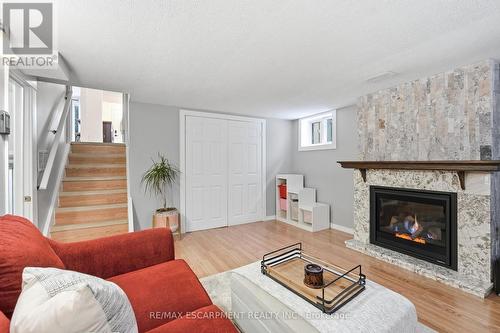 8 Elmore Drive N, Hamilton, ON - Indoor Photo Showing Living Room With Fireplace