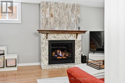 8 Elmore Drive N, Hamilton, ON - Indoor Photo Showing Living Room With Fireplace