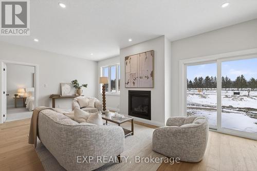 1604 Vandusen Court, London North (North C), ON - Indoor Photo Showing Living Room With Fireplace