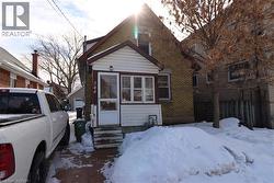 Charming Downtown Guelph Century Home with Modern Comforts & Versatile Studio Space. Welcome to this inviting 1915 brick home, ideally located in the heart of downtown Guelph. - 