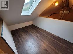 Seller submitted pictures of the garage loft prior to painting. - 