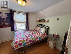 third bedroom with 4 drawer 1 pull door cabinet - 