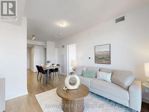 3605 - 2033 Kennedy Road, Toronto, ON - Indoor Photo Showing Living Room