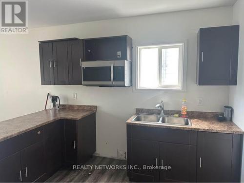 163 Elm Street N, Timmins (Tne - Central), ON - Indoor Photo Showing Kitchen With Double Sink