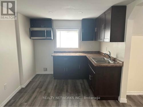 163 Elm Street N, Timmins (Tne - Central), ON - Indoor Photo Showing Kitchen With Double Sink