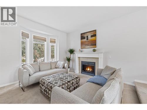 3947 Lakevale Place, Kelowna, BC - Indoor Photo Showing Living Room With Fireplace