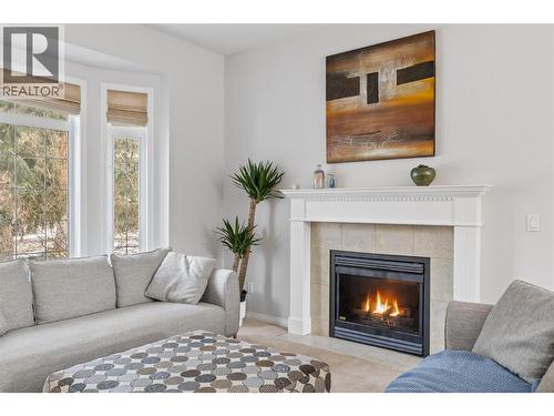 3947 Lakevale Place, Kelowna, BC - Indoor Photo Showing Living Room With Fireplace
