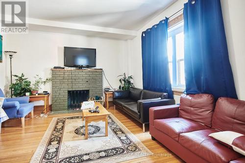 26 Aylmer Avenue, Ottawa, ON - Indoor Photo Showing Living Room With Fireplace