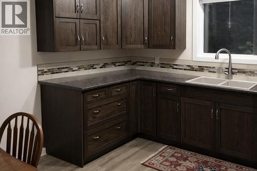 2052 Atkinson Street, Penticton, BC - Indoor Photo Showing Kitchen With Double Sink