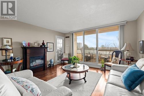 502 - 3 Towering Heights Boulevard, St. Catharines (Glendale/Glenridge), ON - Indoor Photo Showing Living Room With Fireplace