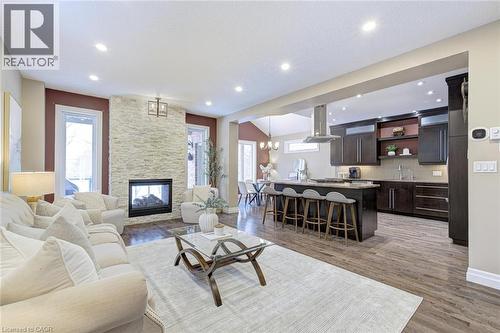 941 Pioneer Grove Court, Kitchener, ON - Indoor Photo Showing Living Room With Fireplace