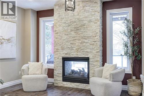 941 Pioneer Grove Court, Kitchener, ON - Indoor Photo Showing Living Room With Fireplace