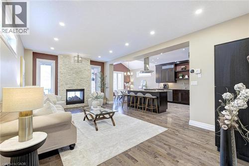 941 Pioneer Grove Court, Kitchener, ON - Indoor Photo Showing Living Room With Fireplace