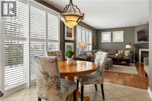 1326 Pepperbush Place, Oakville, ON - Indoor Photo Showing Dining Room With Fireplace