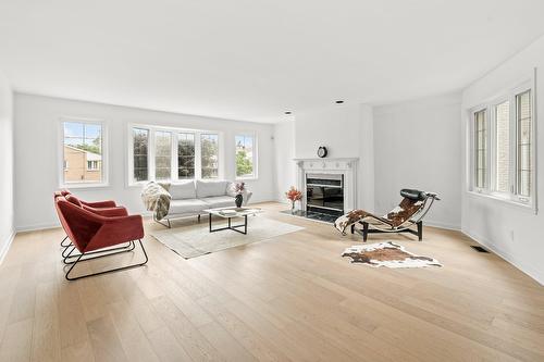 Salon - 28 Av. Greystone, Pointe-Claire, QC - Indoor Photo Showing Living Room With Fireplace