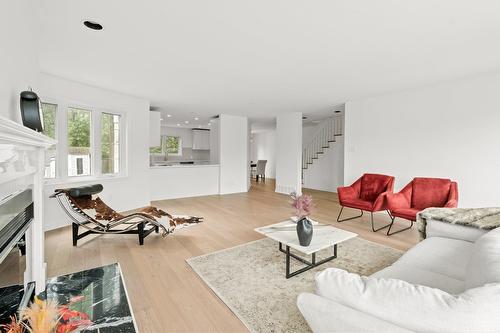 Salon - 28 Av. Greystone, Pointe-Claire, QC - Indoor Photo Showing Living Room With Fireplace