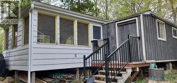 stairs from sunroom and utility/laundry closet - 