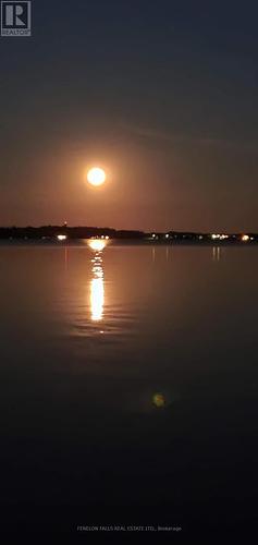 Moonrise reflection - 168 Lakebreeze Road, Kawartha Lakes (Fenelon), ON - Outdoor With Body Of Water With View