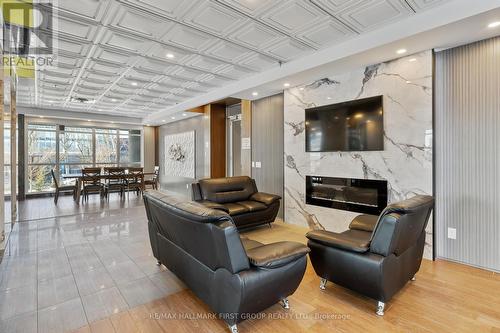 405 - 70 Town Centre Court, Toronto, ON - Indoor With Fireplace