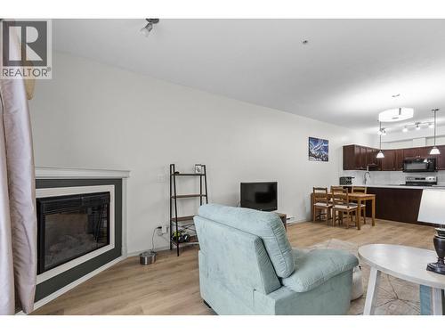 250 Hollywood Road S Unit# 119, Kelowna, BC - Indoor Photo Showing Living Room With Fireplace