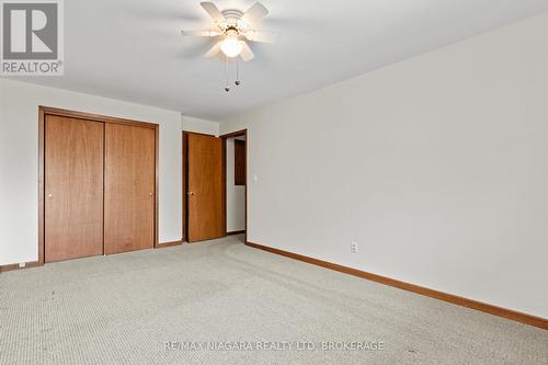 Unstaged primary bedroom - 12 Hampton Court, Welland (Prince Charles), ON - Indoor Photo Showing Other Room