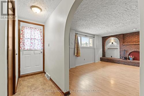 walk out basement separate entrance. - 12 Hampton Court, Welland (Prince Charles), ON - Indoor Photo Showing Other Room With Fireplace