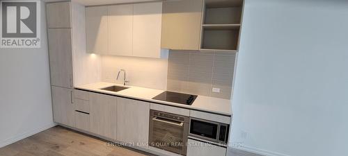 1201 - 1000 Portage Parkway, Vaughan, ON - Indoor Photo Showing Kitchen With Upgraded Kitchen