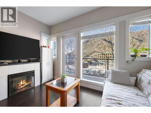 1030 Talasa Way Unit# 2312, Kamloops, BC - Indoor Photo Showing Living Room With Fireplace