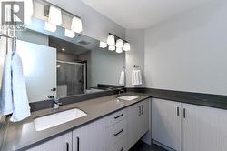 Ensuite with double vanity. - 