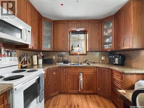 1062 104Th Street, North Battleford, SK - Indoor Photo Showing Kitchen With Double Sink
