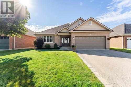 Front View Summer - 90 Weston Drive, Tillsonburg, ON - Outdoor With Facade
