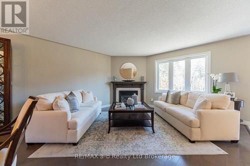 With Gas Fireplace - 90 Weston Drive, Tillsonburg, ON - Indoor Photo Showing Living Room With Fireplace
