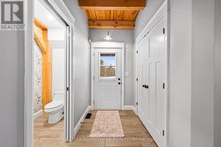 Coat Closet/2pc Bath - Exit to backyard - Main lev - 